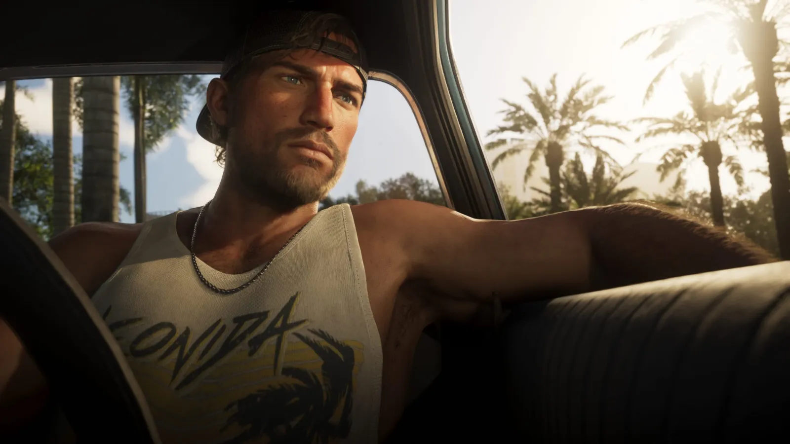 Jason driving a convertible down a palm-lined Vice City road in daylight in GTA 6