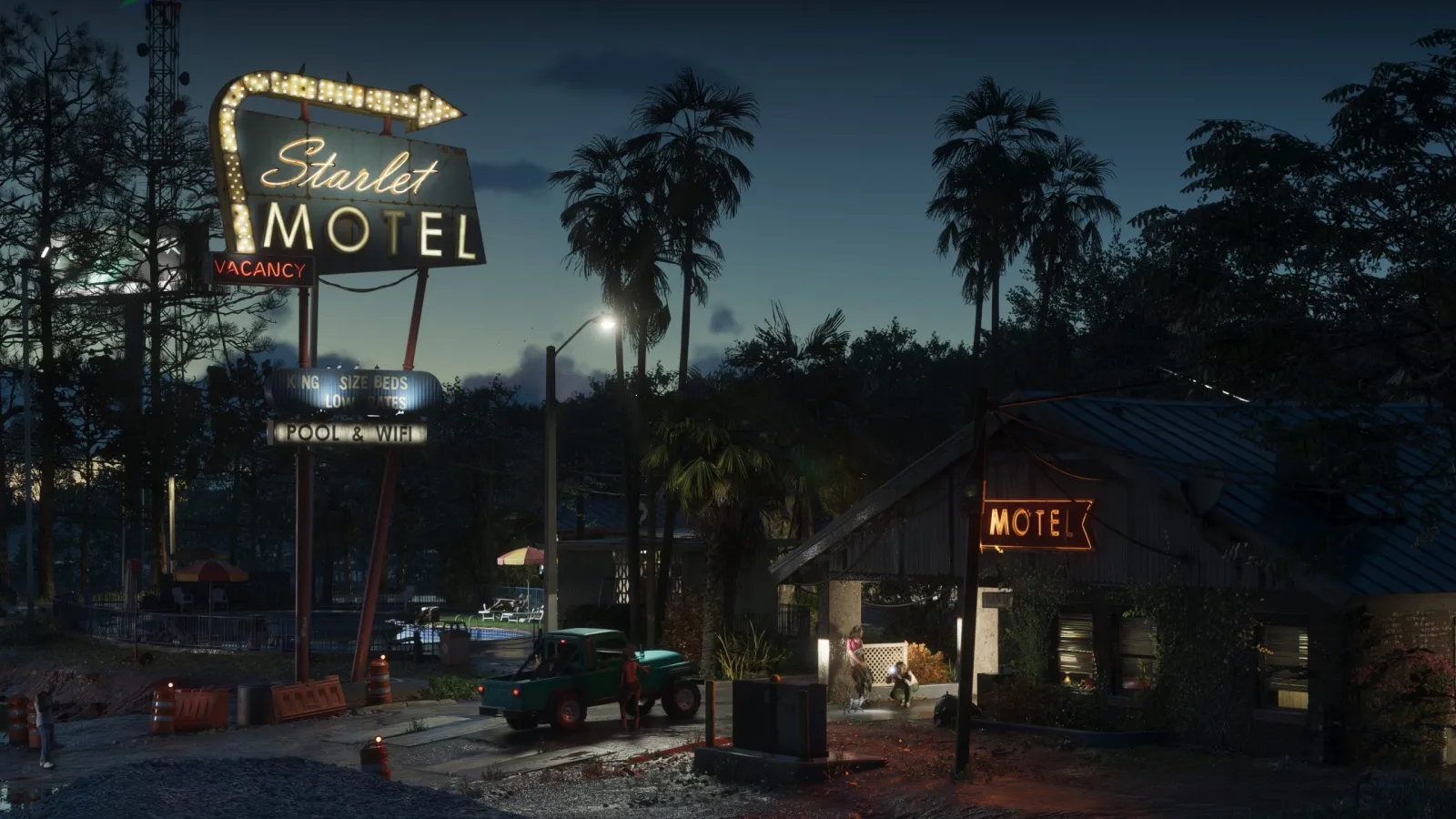 The retro neon sign of the Starlet Motel glowing at dusk in GTA 6's Port Gellhorn